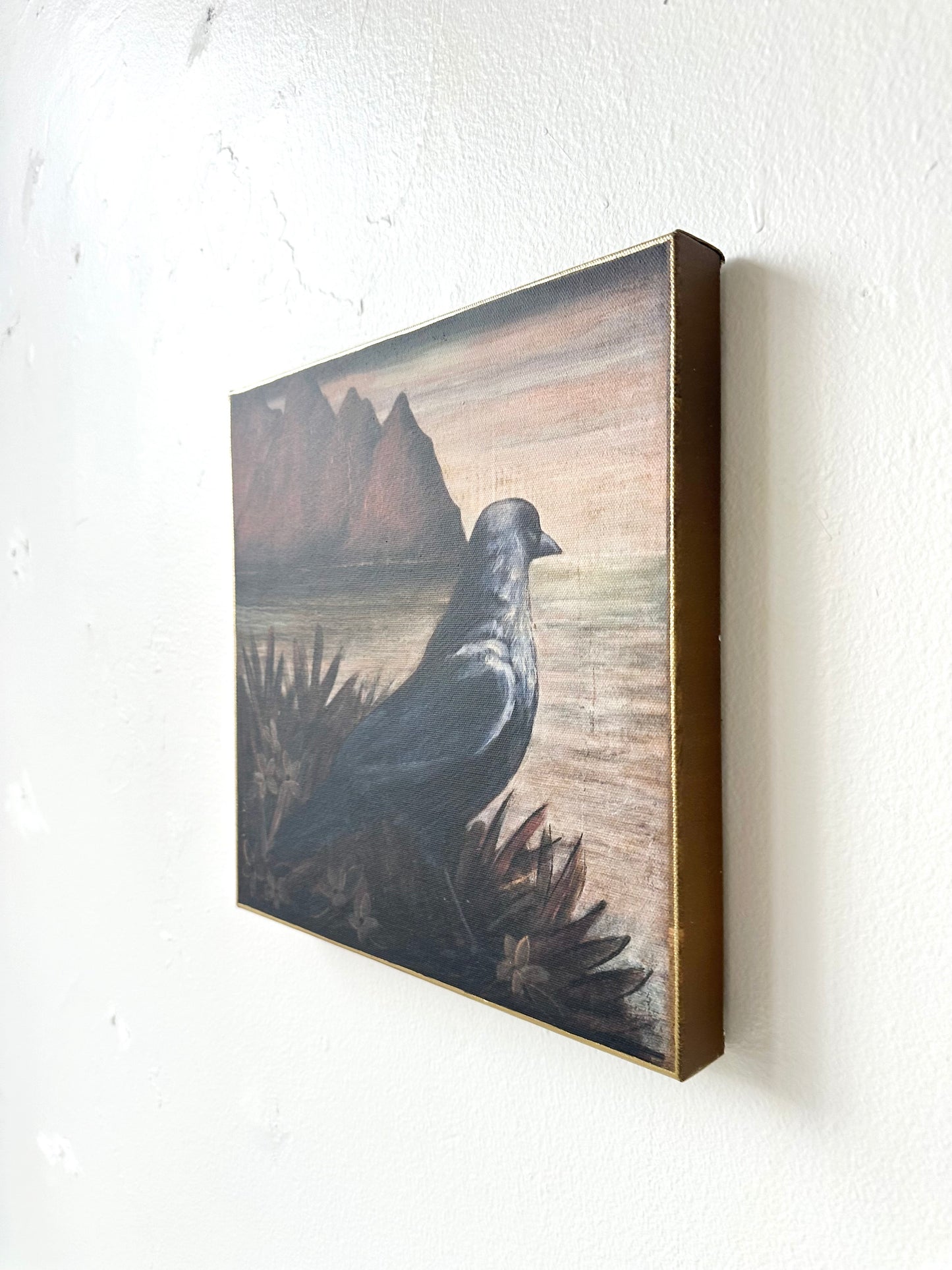 "Watchful" 12" x 12" fine art print on canvas depicting a blackbird looking out to sea
