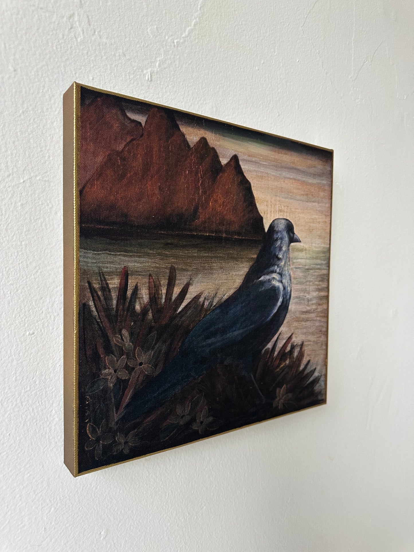 "Watchful" 12" x 12" fine art print on canvas depicting a blackbird looking out to sea
