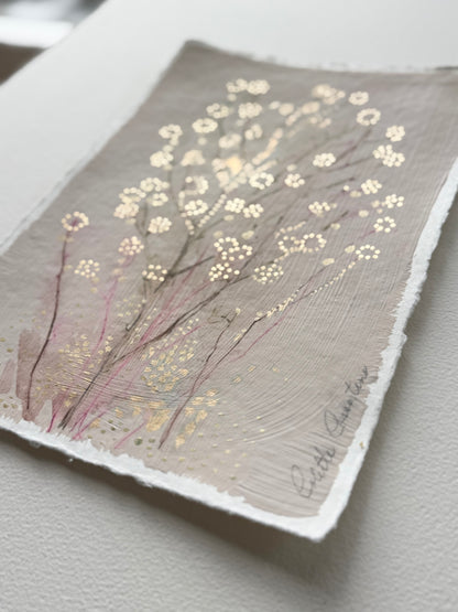 Painting of delicate flowers on handmade paper