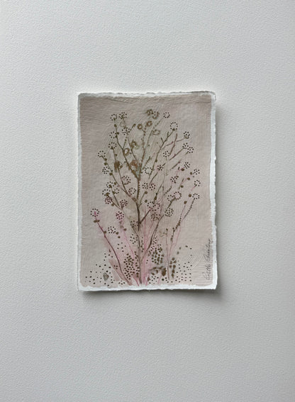Painting of delicate flowers on handmade paper