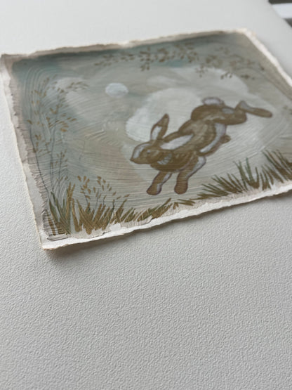 "Bounding Bunny" painting on handmade paper of a rabbit jumping