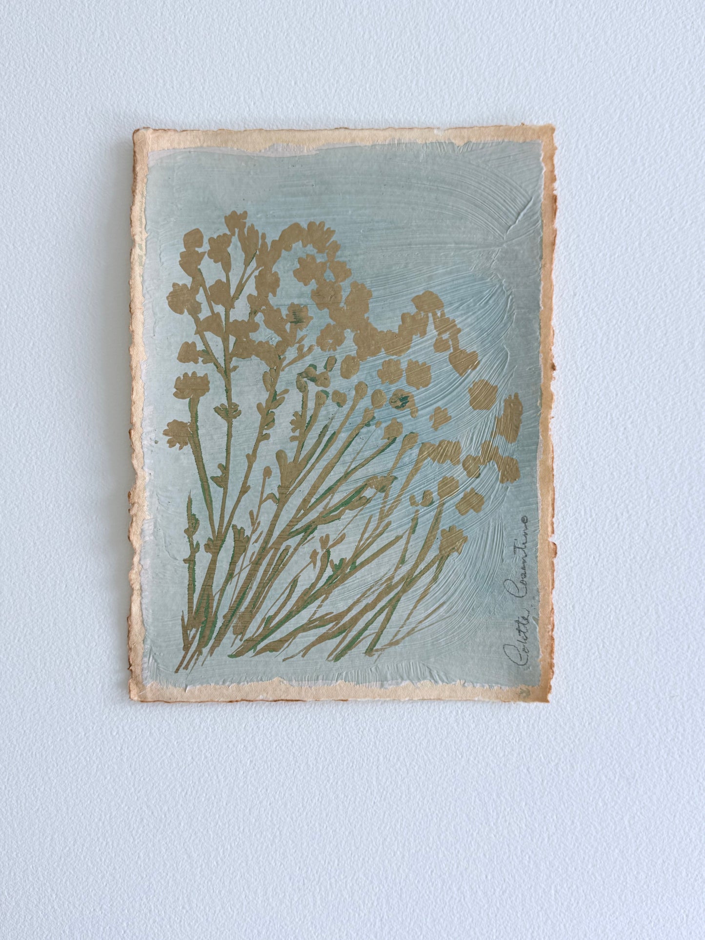 Wild floral sprigs on handmade paper