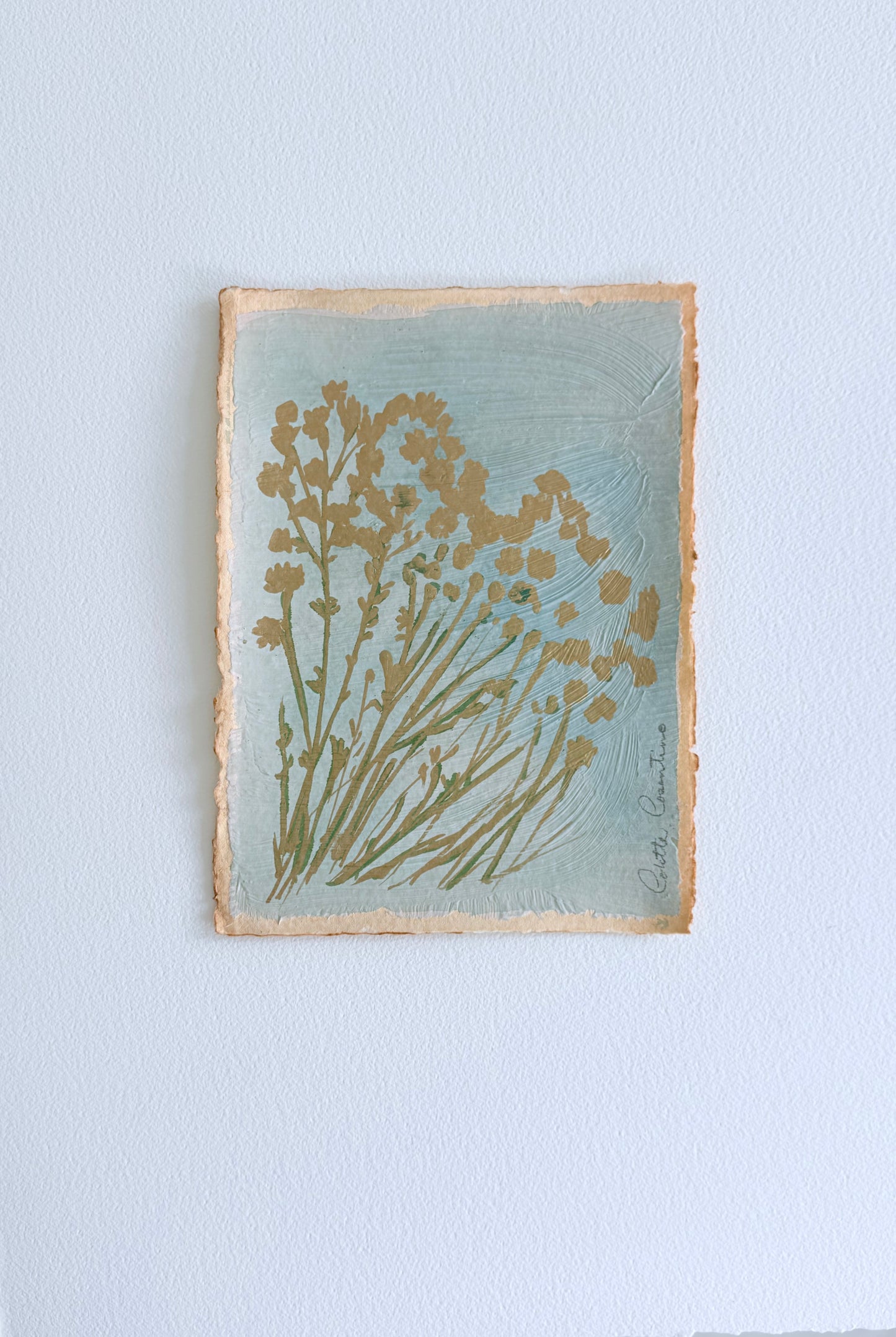 Wild floral sprigs on handmade paper