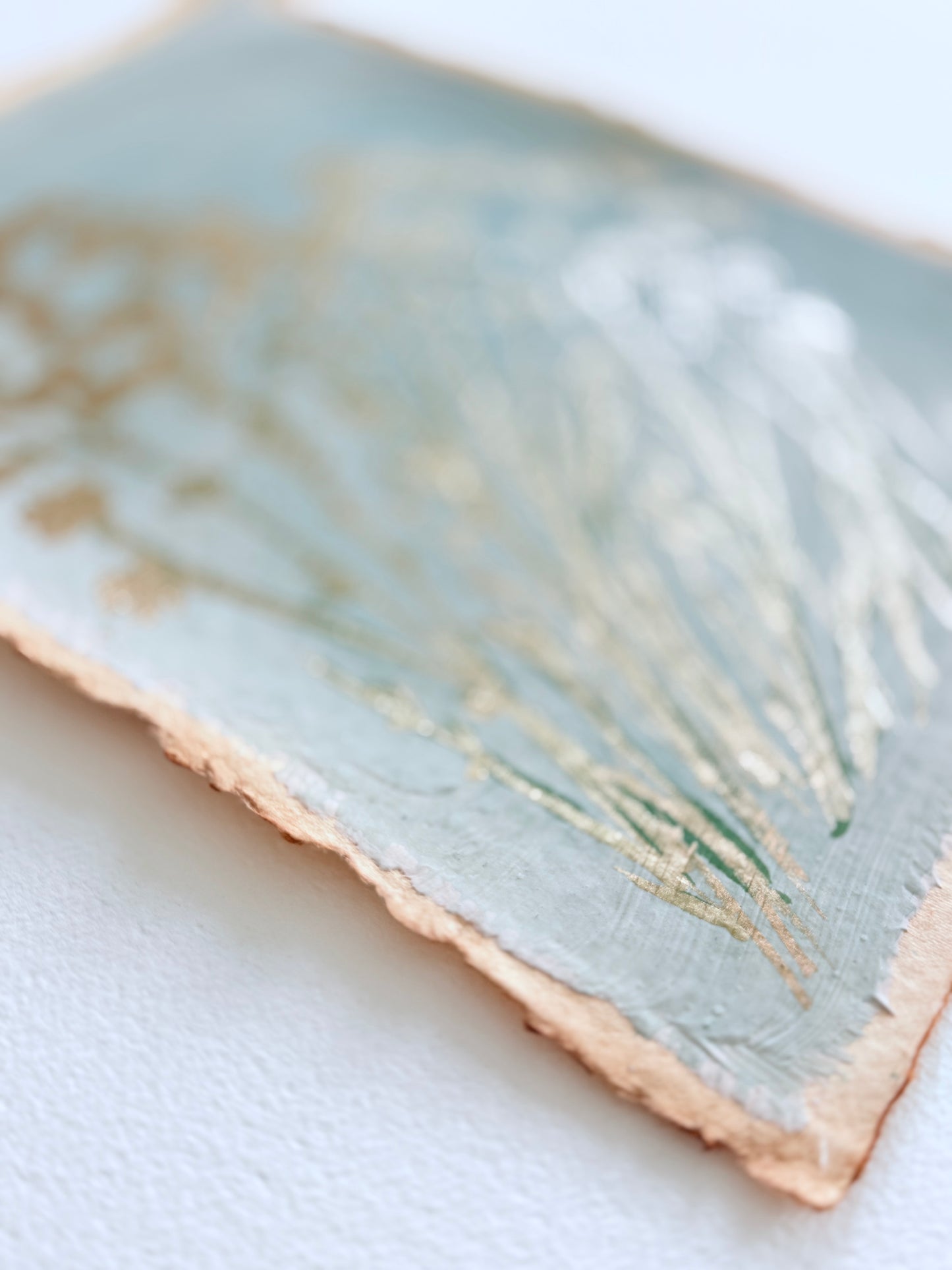Wild floral sprigs on handmade paper