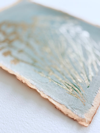 Wild floral sprigs on handmade paper